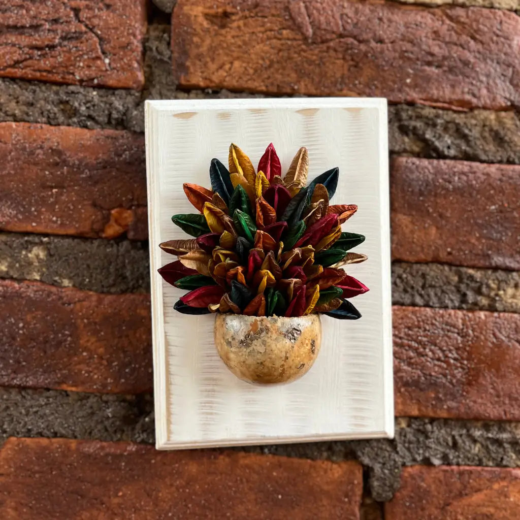 "Um quadro de parede feito de madeira com vaso de sementes"